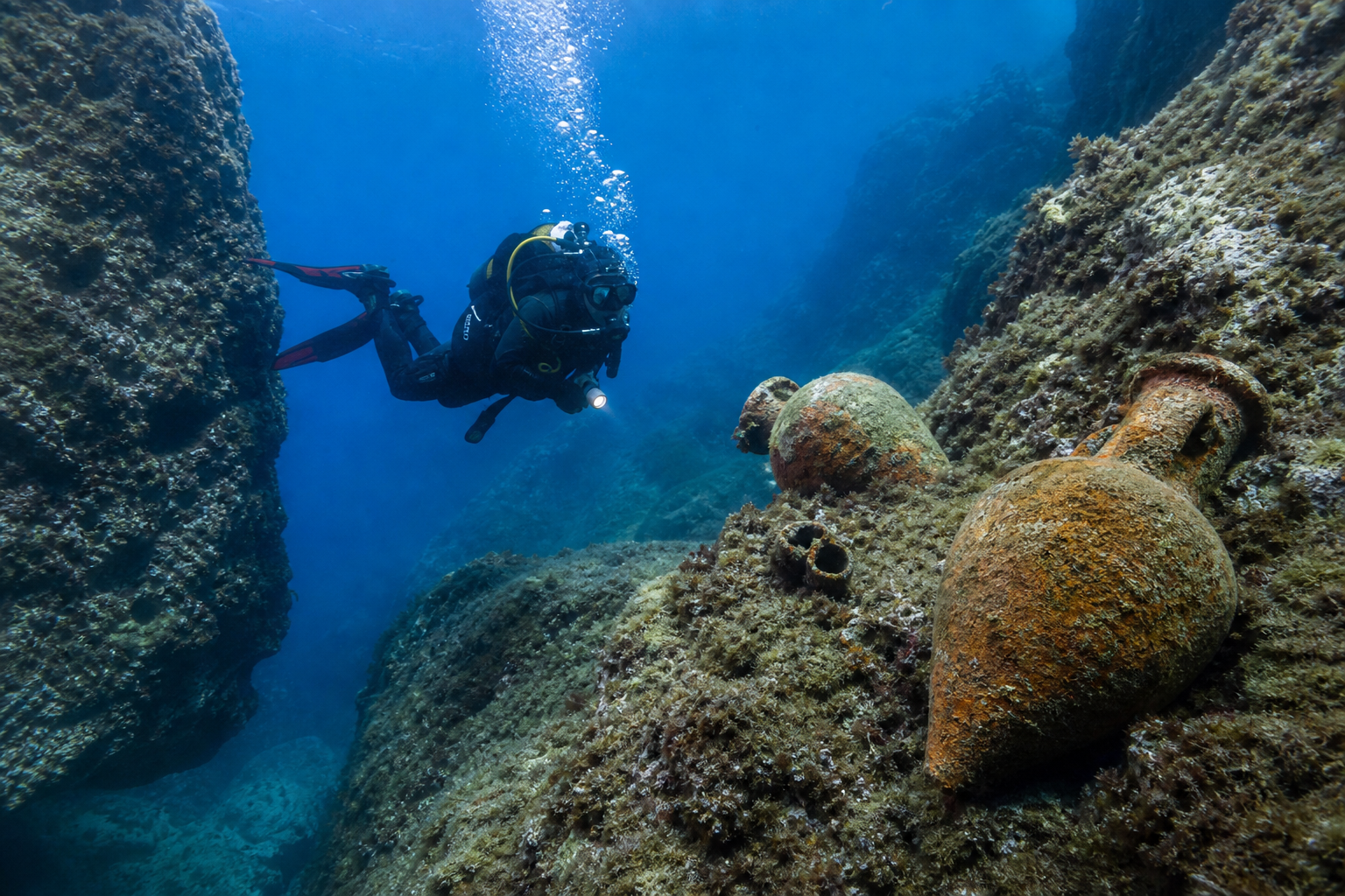 Diver exploring a Croatian reef wall
